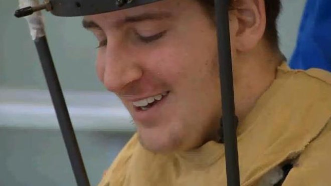 paralyzed high school player.jpg
